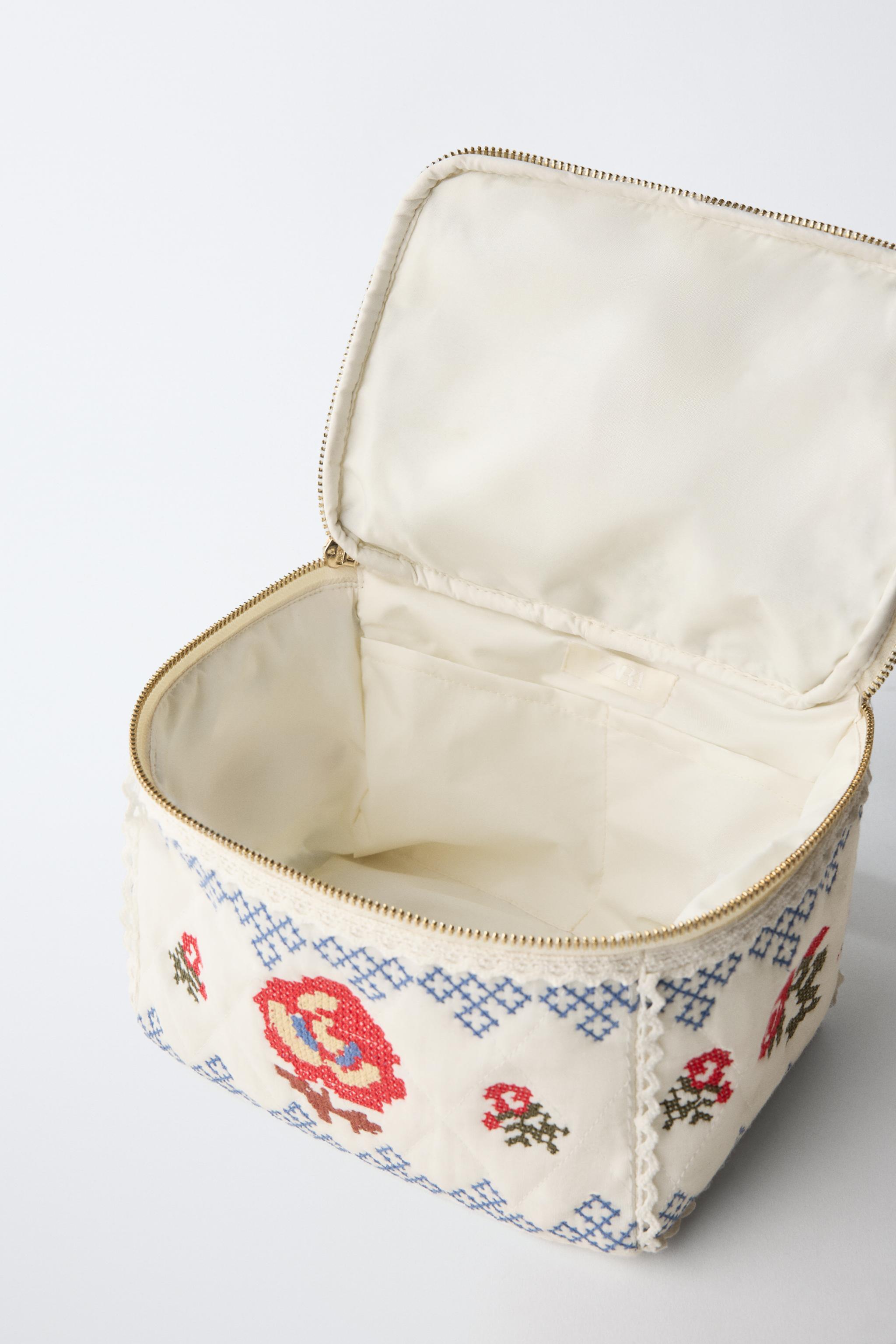 EMBROIDERED TOILETRY BAG